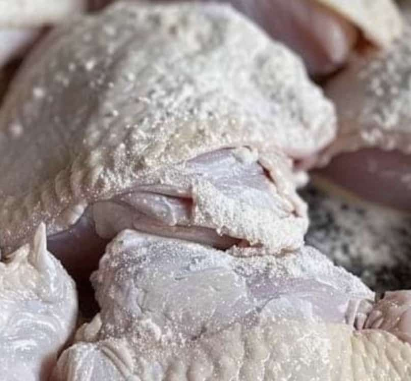 Coat chicken in flour and toss in slow cooker. With only 4 more ingredients, get a terrific dinner