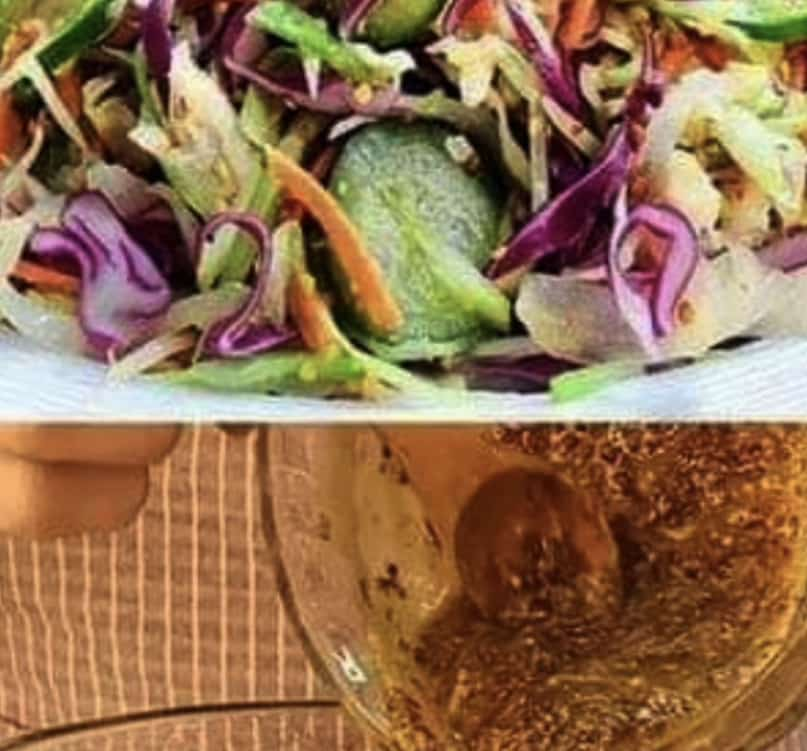 Crispy cabbage salad topped with a dressing