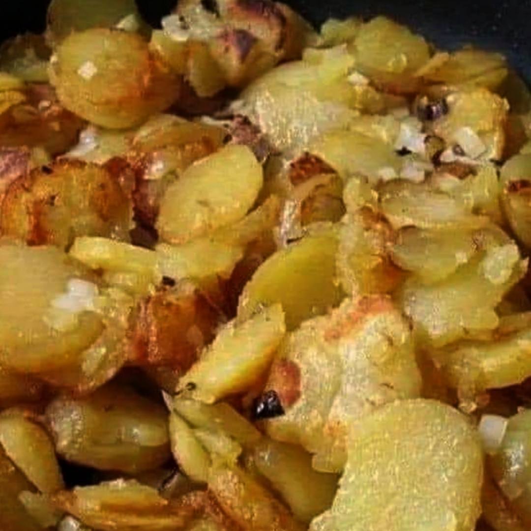 Fried Potatoes Onions And Smoked Polish Sausage